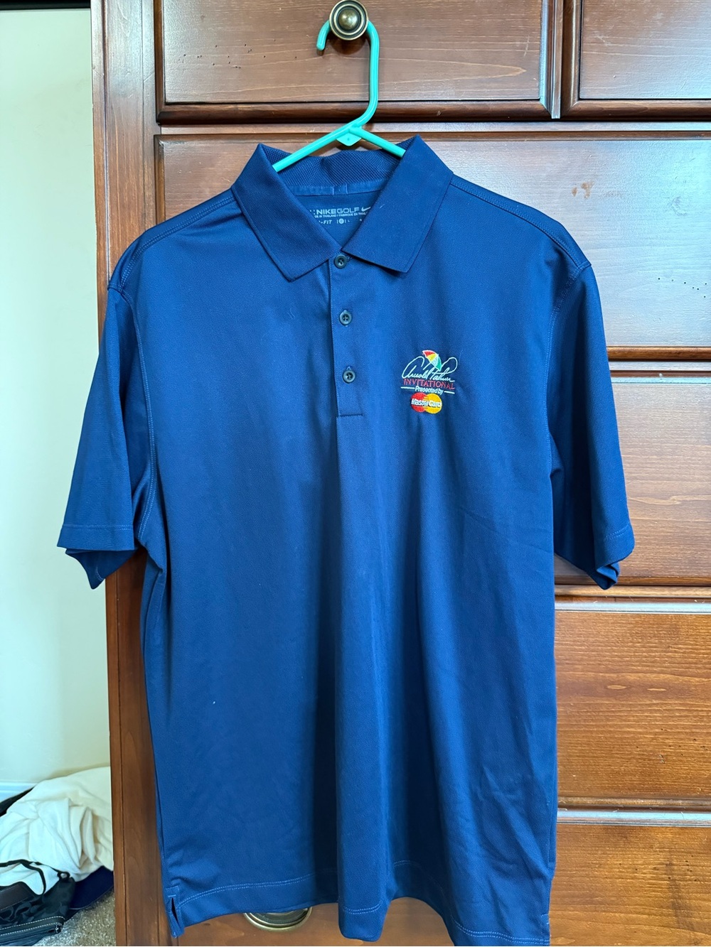 Nike Golf Men's Navy Blue Polo Shirt with Embroidered Logo